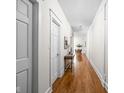 Hallway with hardwood floors leading to dining area at 970 Fort Wayne Ave # 301, Indianapolis, IN 46202