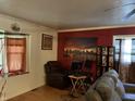 Living room features hardwood floors, a fireplace, and comfortable seating at 3991 Bennett Dr, Indianapolis, IN 46254
