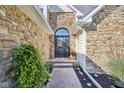 Front entry with stone accents and a double door at 1724 Sunrise Cir, Indianapolis, IN 46229