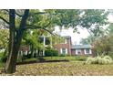 Brick house exterior with landscaping at 7722 Shady Hills W Dr, Indianapolis, IN 46278