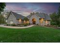 Brick home with lush lawn and inviting entryway at 2733 Foxborough Dr, Greenwood, IN 46143