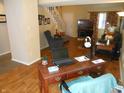 Open living area showcasing a work-from-home space and cozy seating at 1141 Paradise N Way # C, Greenwood, IN 46143