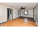 Simple living room with laminate flooring needing renovation at 214 Tippecanoe Dr, Noblesville, IN 46062
