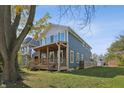 Two-story craftsman home with front porch at 628 N Beville Ave, Indianapolis, IN 46201