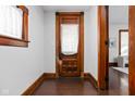 Entryway with hardwood floors and wood door at 1846 Barth Ave, Indianapolis, IN 46203