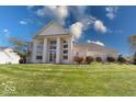 Two-story home with columns and large windows at 1957 Cherry Tree Rd, Avon, IN 46123
