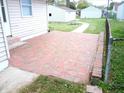 Brick patio adjacent to the house, ideal for outdoor relaxation at 309 S Fleming St, Indianapolis, IN 46241