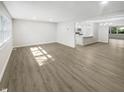 Spacious living room with hardwood floors and open floor plan at 926 Stockton St, Indianapolis, IN 46260