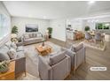 Virtually staged living room and open concept kitchen at 926 Stockton St, Indianapolis, IN 46260