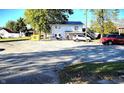 Gravel parking area with view of home and lot at 290 W Washington St, Martinsville, IN 46151
