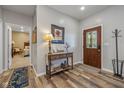 Inviting entryway with a console table and view to a bedroom at 512 S Cherry St, Westfield, IN 46074