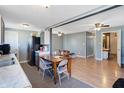 Kitchen with gray cabinets, a dining area, and view of living room at 1120 Lexington Ave, Indianapolis, IN 46203