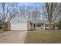 Ranch home with attached garage and front porch at 5346 Shefford Ct, Indianapolis, IN 46254