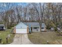 Ranch home with attached garage and front porch at 5346 Shefford Ct, Indianapolis, IN 46254