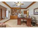 Spacious home office with built-in shelving and desk at 1079 Old Eagle Way, Greenwood, IN 46143