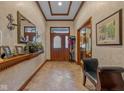 Elegant entryway with tiled floor and wood accents at 1079 Old Eagle Way, Greenwood, IN 46143