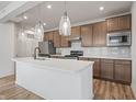 Modern kitchen with stainless steel appliances and island at 802 Weldon Way, Westfield, IN 46074