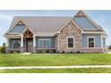 Front view of two-story craftsman home at 4407 W Wandalee Ct, New Palestine, IN 46163