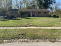 Brick ranch home with a spacious yard at 647 W Mcgregor Rd, Indianapolis, IN 46217