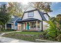 Newly renovated craftsman style home with a welcoming front porch at 2221 E Michigan St, Indianapolis, IN 46201