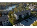 Aerial view of a condo building near a lake at 8168 Shorewalk Dr # A, Indianapolis, IN 46236