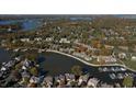 Waterfront community with autumn foliage and lake views at 8168 Shorewalk Dr # A, Indianapolis, IN 46236