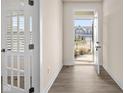 Bright entryway with hardwood floors and French doors at 16703 Ayshire Dr, Fishers, IN 46037
