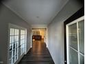 Bright entryway with hardwood floors and French doors at 3609 Merchmont Rd, Bargersville, IN 46106