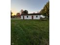 Detached two-car garage with red doors at 589 N Sunset Ct, Greenfield, IN 46140