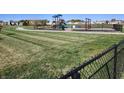Community playground with playset and swings at 428 N Wyndstone Way, Fortville, IN 46040