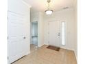 Bright entryway with tile flooring, coat closet, and access to other rooms at 3518 Heathcliff Ct, Westfield, IN 46074