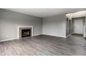 Spacious living room with fireplace and grey flooring at 19420 Golden Meadow Way, Noblesville, IN 46060