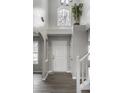 Bright entryway with high ceilings and grey flooring at 19420 Golden Meadow Way, Noblesville, IN 46060