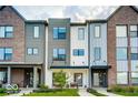 Modern three-story townhouses with front porches at 1817 N New Jersey St, Indianapolis, IN 46202