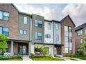 Modern three-story townhouses with front porches at 1817 N New Jersey St, Indianapolis, IN 46202