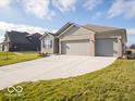 Two-story house with a three-car garage and front yard at 2298 Pine Valley Dr, Plainfield, IN 46168