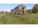 Two-story house with a large lawn and landscaping at 236 N Liberty Blvd, Mooresville, IN 46158