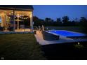 Night view of inground pool with patio furniture at 3503 W 100 N, Bargersville, IN 46106