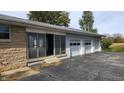 Three-car attached garage with a separate entrance at 2620 Wicker Rd, Indianapolis, IN 46217