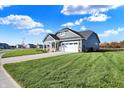 Gray siding craftsman style home with a large yard at 7144 Rose Hill Ave, Brownsburg, IN 46112