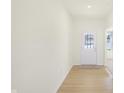 Bright and airy entryway with light flooring and neutral walls at 7144 Rose Hill Ave, Brownsburg, IN 46112
