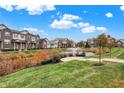 Community with pond, fountain, and manicured lawns at 8334 Codesa Way, Indianapolis, IN 46278