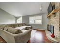 Spacious living room featuring a cozy fireplace and hardwood floors at 2005 Deer Lake Dr, Martinsville, IN 46151