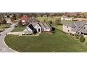 Luxury home on a corner lot with a beautifully landscaped yard at 7610 Monte Carlo Way, Indianapolis, IN 46278