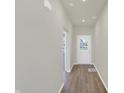 Bright entryway with light walls and wood-look floors at 7149 Rose Hill Ave, Brownsburg, IN 46112