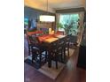 Dining room with a wooden table and six chairs at 11155 Baywood Ln, Indianapolis, IN 46236