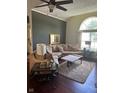 Spacious living room with a large sectional sofa and hardwood floors at 11155 Baywood Ln, Indianapolis, IN 46236