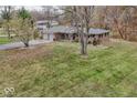 Ranch home with two-car garage and large backyard at 8190 Beech Grove Rd, Martinsville, IN 46151