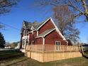 Back of the house showcasing a large deck and a spacious yard at 503 E Clyde St, Frankton, IN 46044