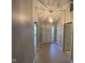 Bright and airy foyer with tile flooring and a chandelier at 1229 Spencer Dr, Greenwood, IN 46143